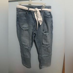 Maurices women’s size 12 distressed blue jeans with adorable white cloth belt.
